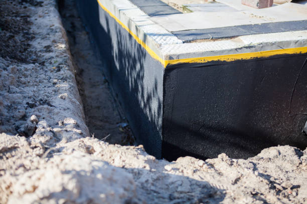 Professional Waterproofing technician working in Harmans, MD